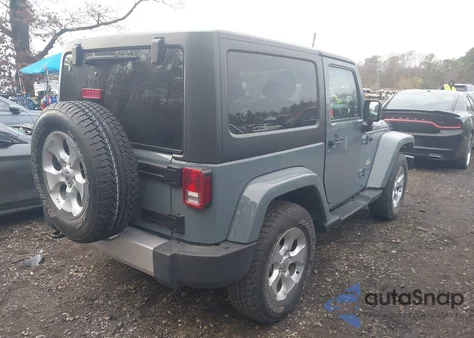 2014 Jeep Wrangler Sahara z USA, uszkodzony, nr VIN 1C4GJWBG7EL183430